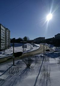 Scenic view of snow covered landscape against clear sky