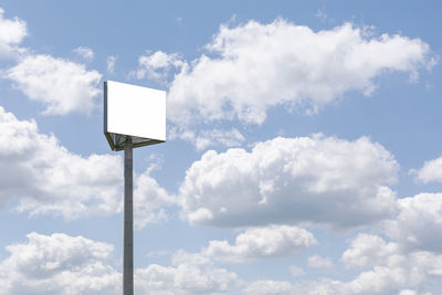 Low angle view of street light against sky