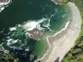 High angle view of surf on beach