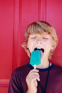 Close-up of a boy eating ice cream