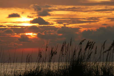 Scenic view of sunset over lake