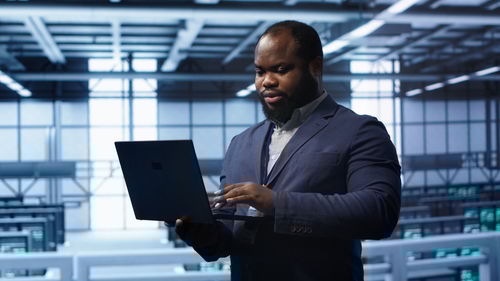 Young man using digital tablet
