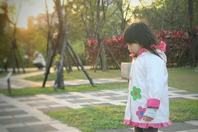 Woman standing in park