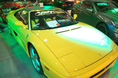 High angle view of yellow car on street