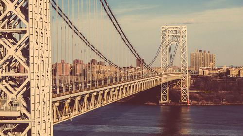 George washington bridge over river against sky