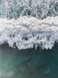 Aerial view of huge waves in sea