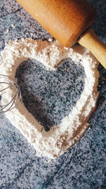 High angle view of heart shape on cutting board