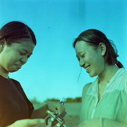 Two women with bicycle