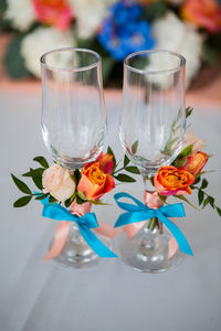 Wedding glasses on the table with decorations and flowers