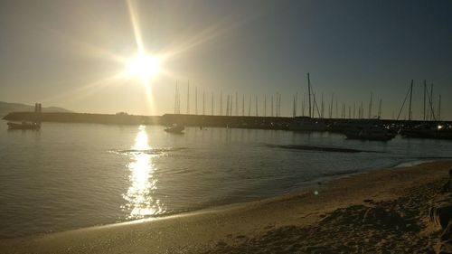 Scenic view of beach at sunset