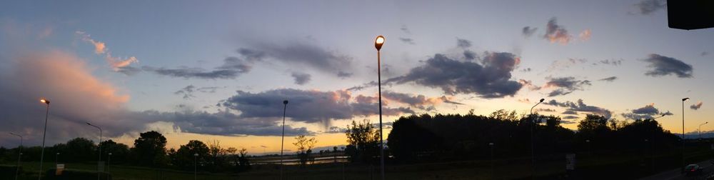 Scenic view of cloudy sky at sunset