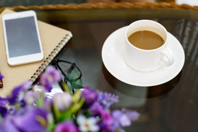 High angle view of coffee cup on table