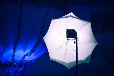 Low angle view of lighting equipment in darkroom