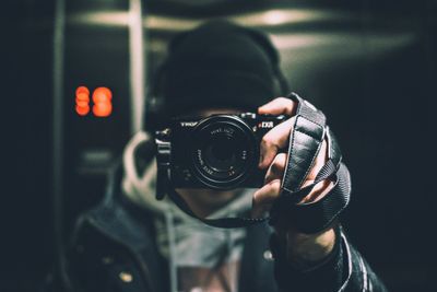 Man photographing with camera