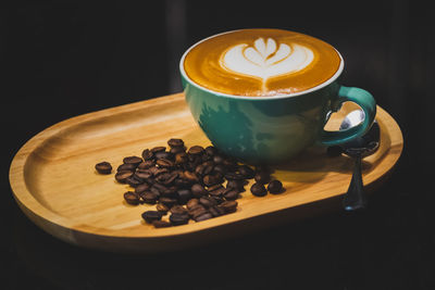 Close-up of coffee cup on table