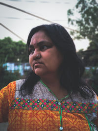 Close-up of woman looking away