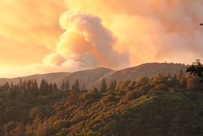 Scenic view of mountains against sky during sunset