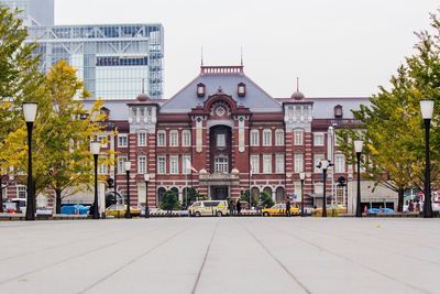 View of buildings in city against clear sky