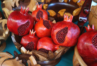 View of pomegranate in wooden container