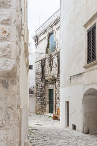 Alley amidst old building