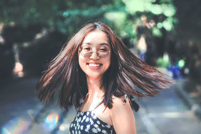 Portrait of smiling young woman