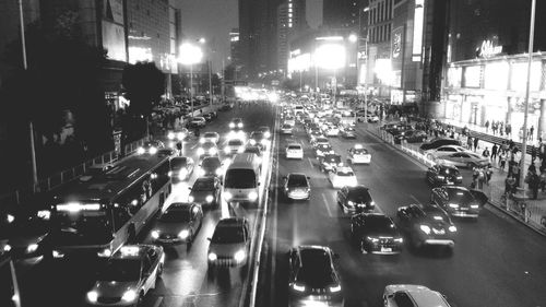 High angle view of traffic on city street at night