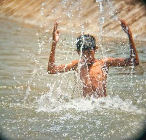 Man swimming in sea