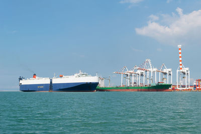 View of ship in sea against sky