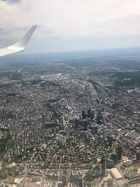 Aerial view of city against sky