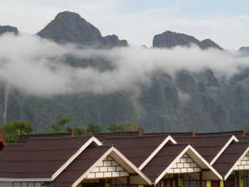 High section of houses against mountains