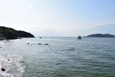 Scenic view of bay against sky