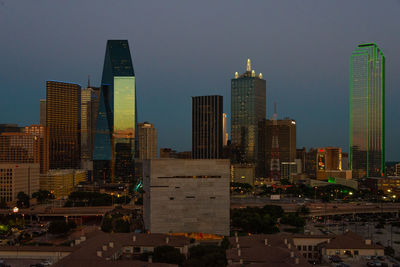 Illuminated buildings in city