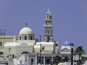 Low angle view of church against clear blue sky