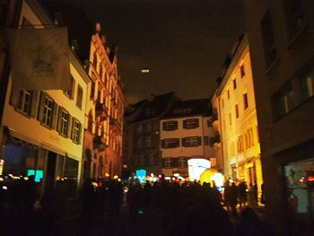 Buildings in city at night