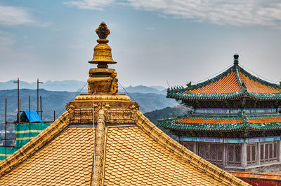 View of temple building against sky