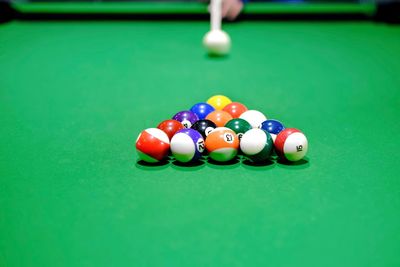 Multi colored balls on table