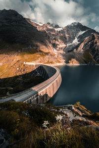 High angle view of dam by river against sky