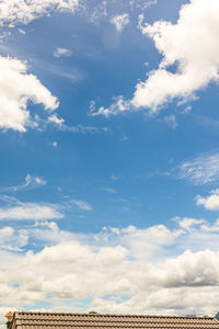 Soft white clouds and blue sky