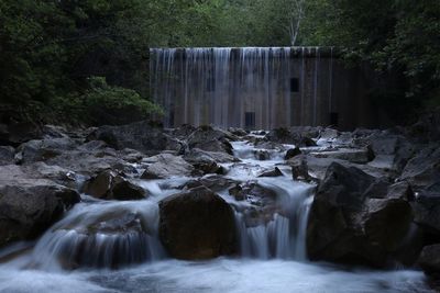 Scenic view of waterfall in forest