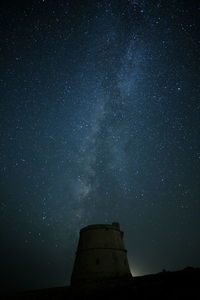 Low angle view of stars against sky at night