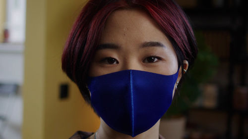 Close-up of woman wearing mask