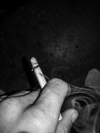Woman holding cigarette