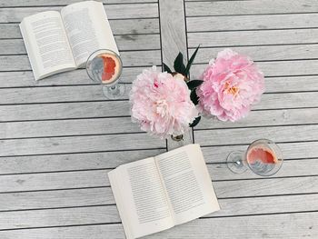 High angle view of pink flower on table