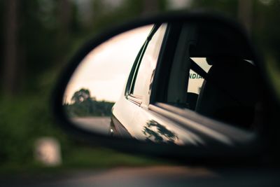 Close-up of car on side-view mirror