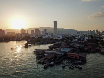 View of buildings against sky during sunset