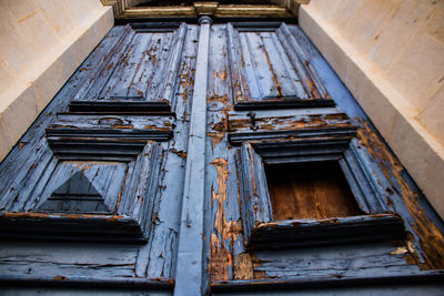 Low angle view of old abandoned building