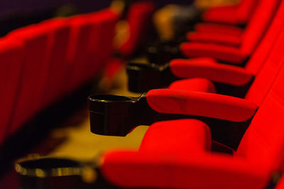 Close-up of empty seats in movie theater