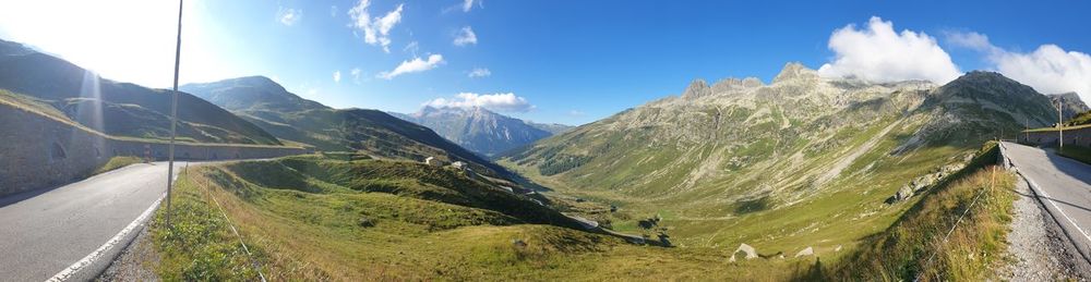 Panoramic view of road amidst mountains against sky