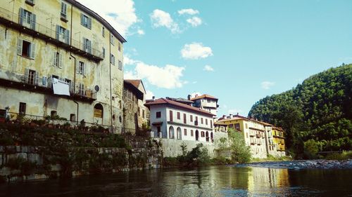 View of canal with buildings in background