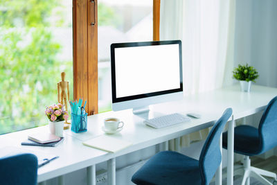 Empty chairs and table at home